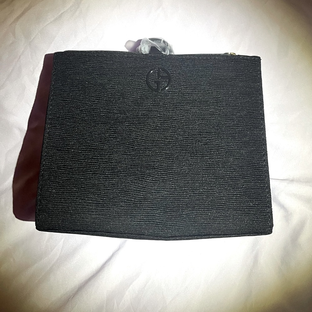 Giorgio Armani beauty bag or wrist clutch.